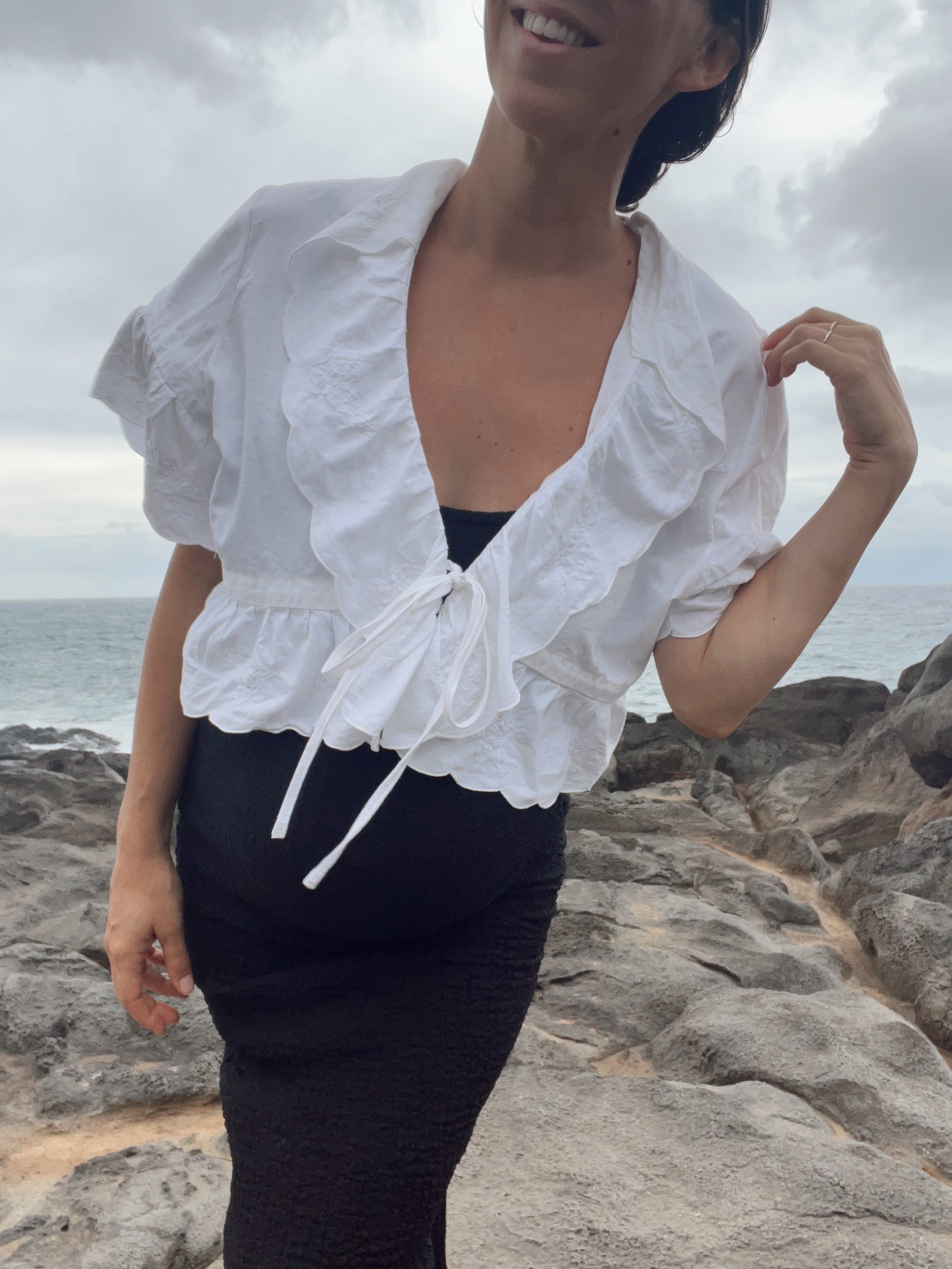 A Ruffled Edge Embroidered Top