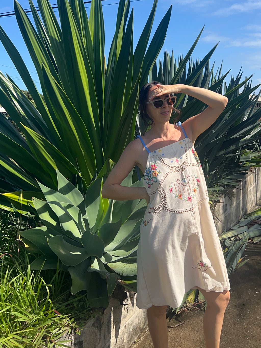 An Embroidered Floral Dress with tie straps