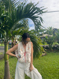 An Embroidered Floral Top