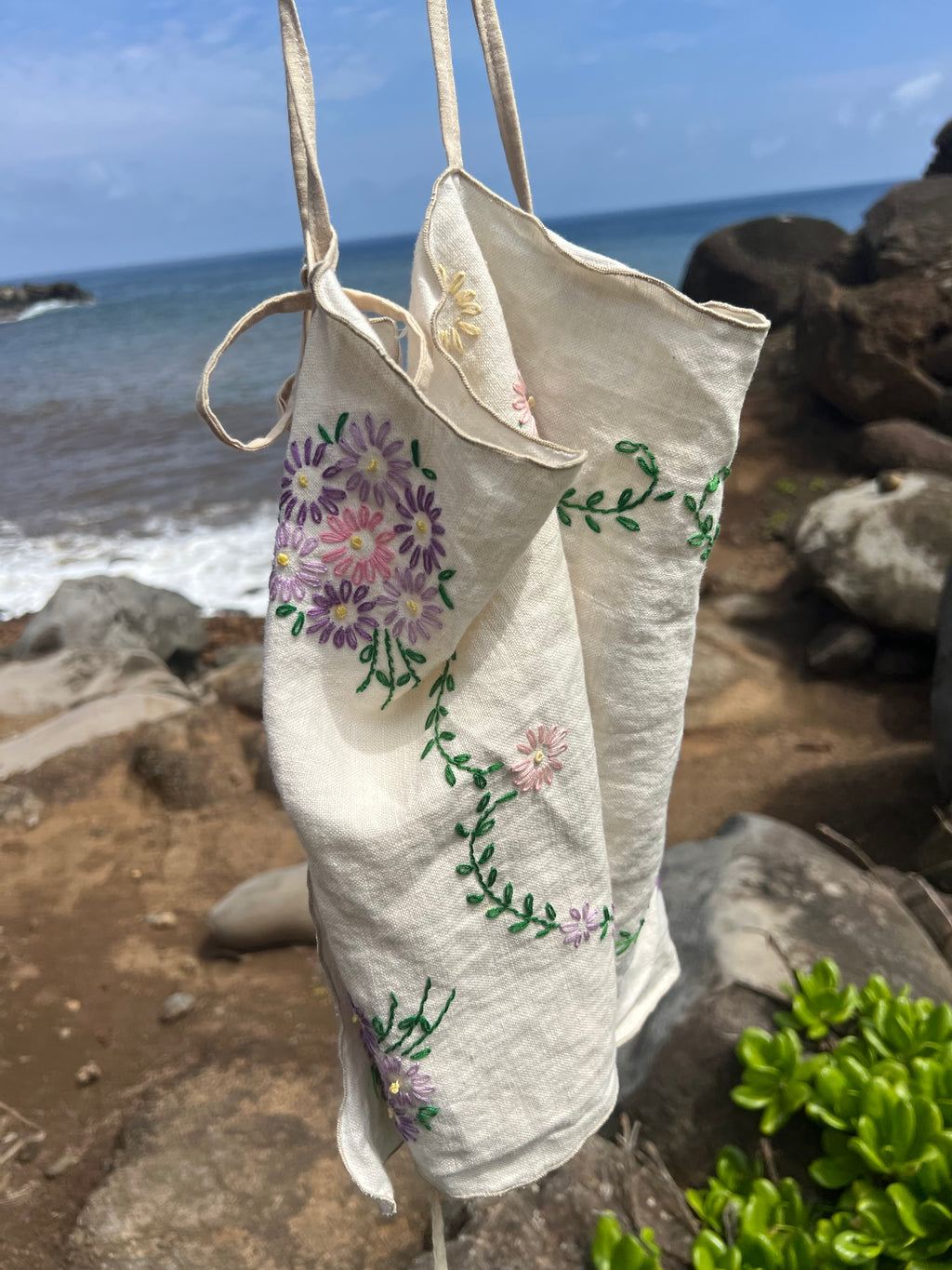 A floral embroidered tie back tank