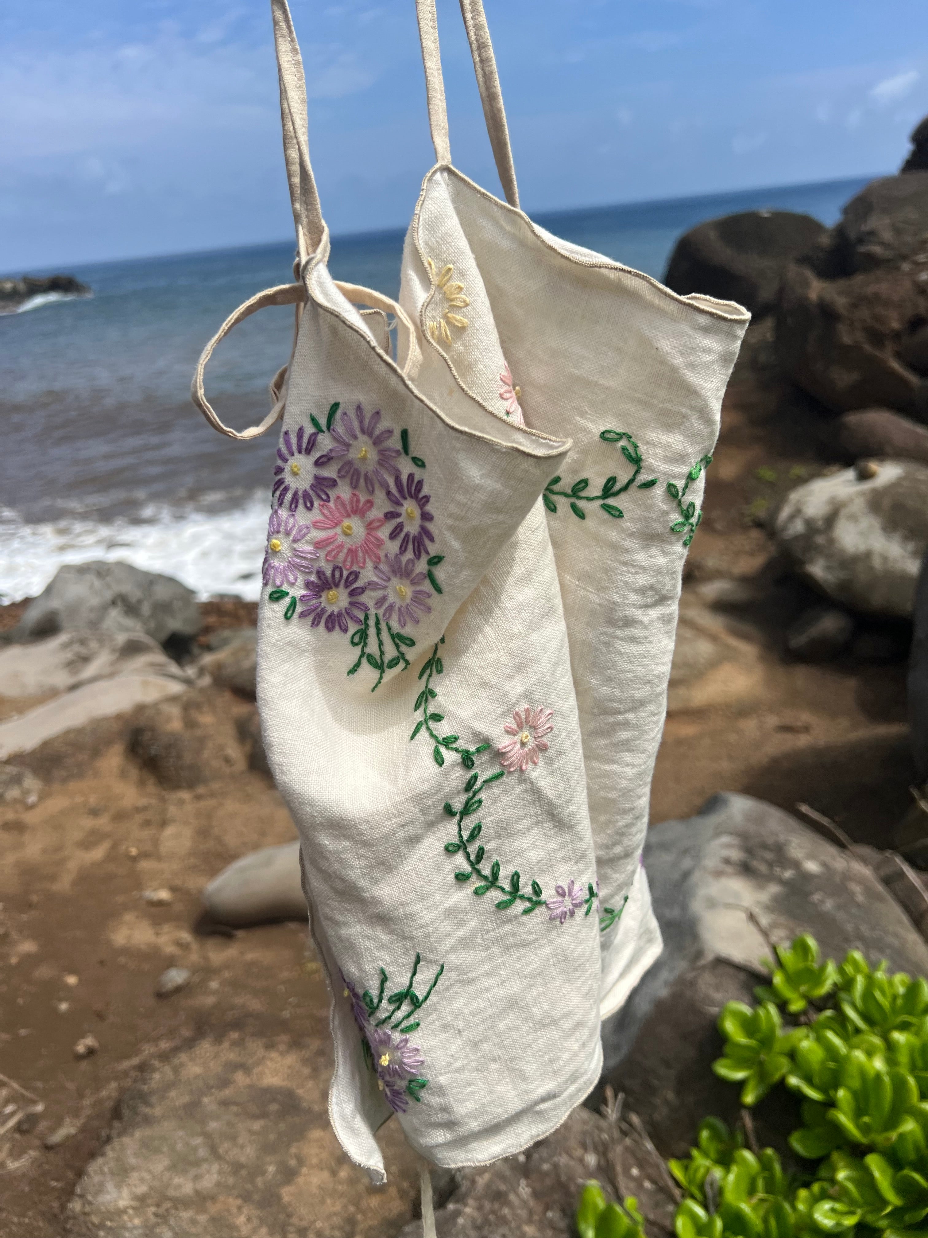 A floral embroidered tie back tank