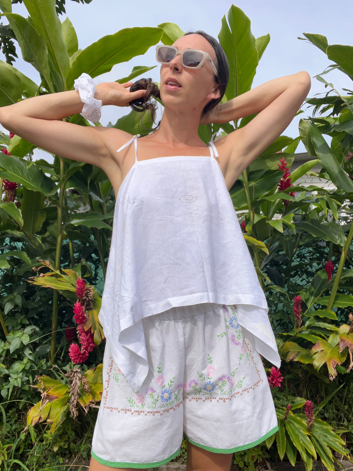 A delicate embroidered tie strap tank