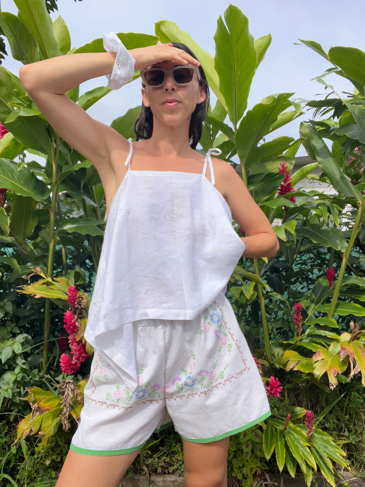 A delicate embroidered tie strap tank