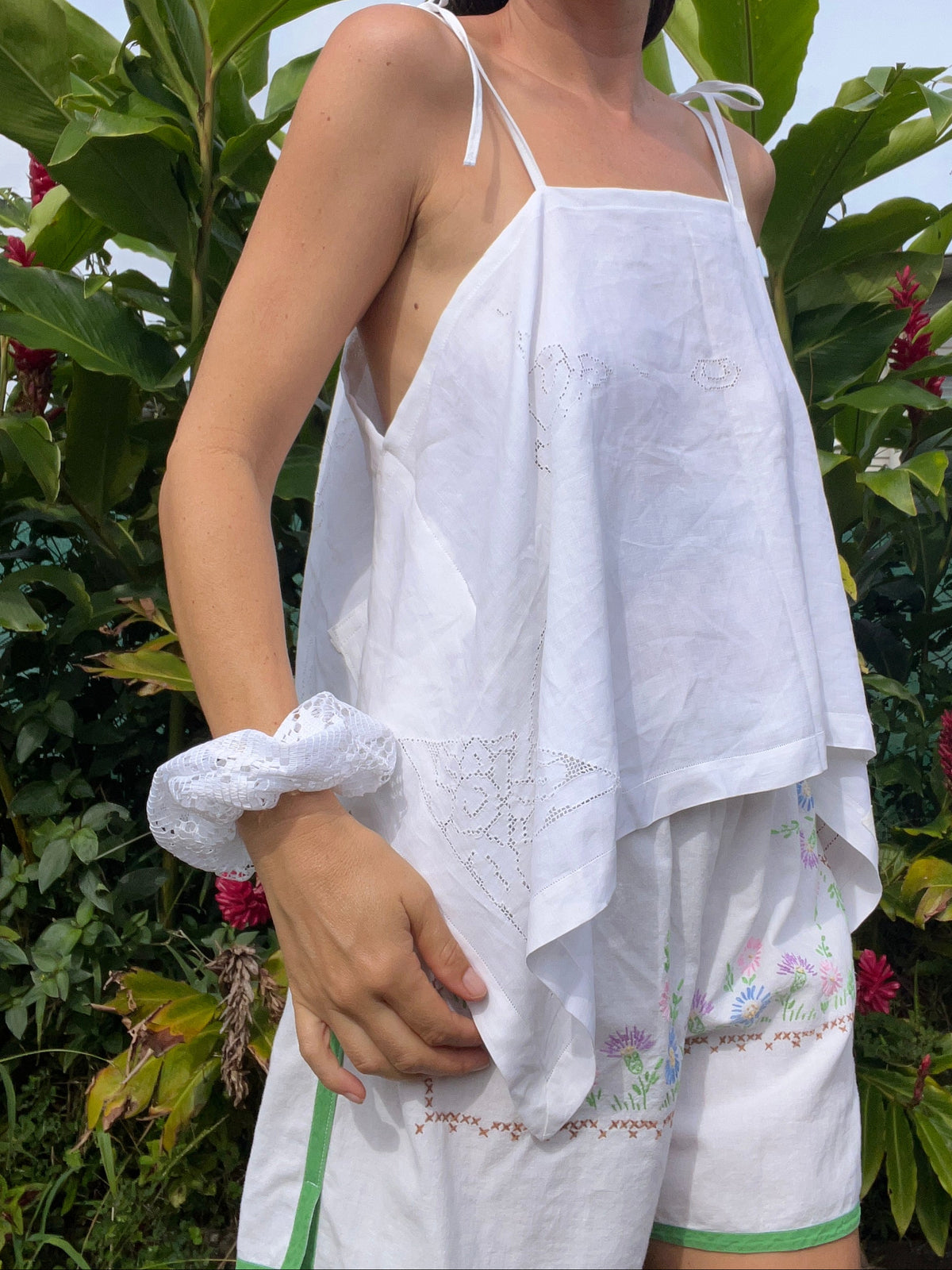 A delicate embroidered tie strap tank